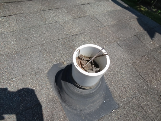 What Happens When a Roof Plumbing Vent Gets Blocked? Why That Open PVC Pipe Matters