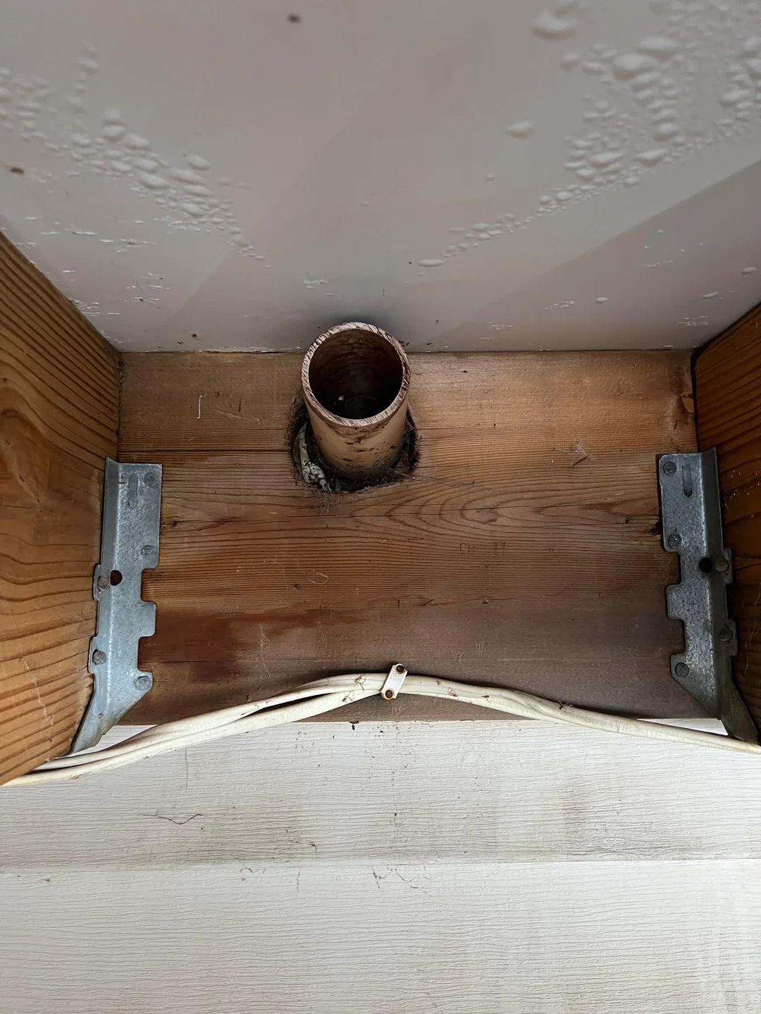 Furnace Vents Under a Deck? Why Exhaust Direction Matters Before Winter