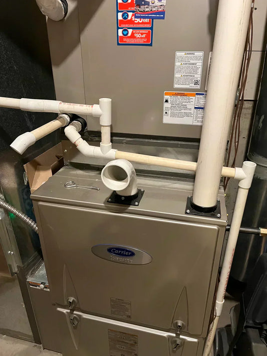 Furnace vent showing backdraft issue and LGQF-LL PVC vent cap solution