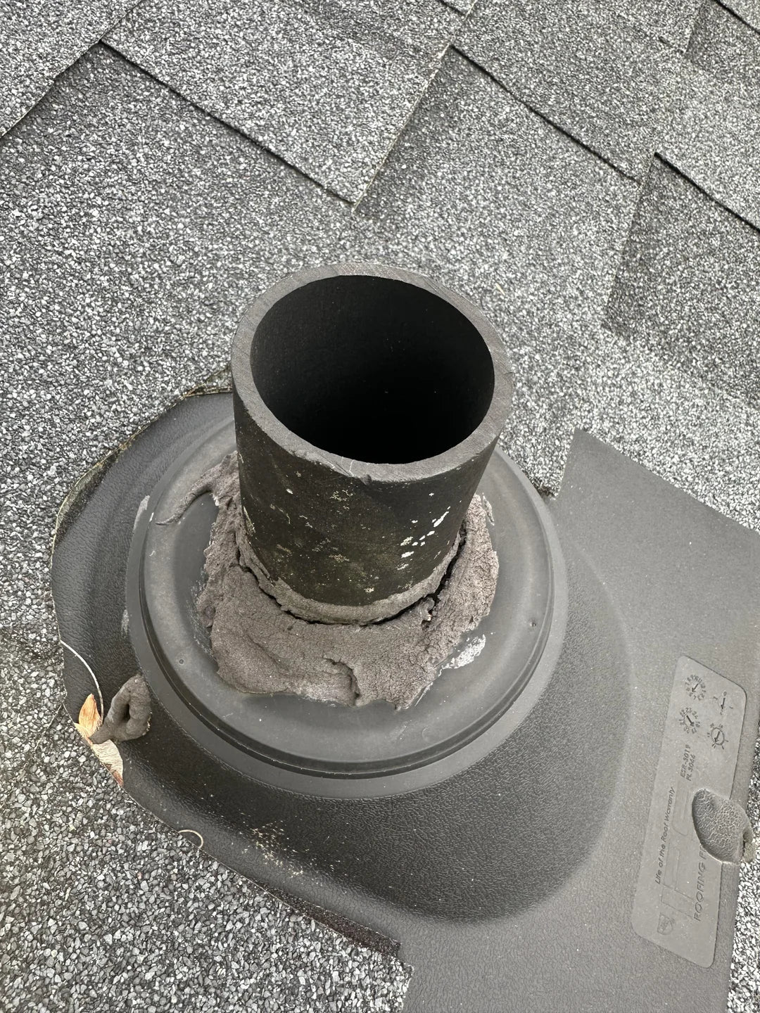 Image showing a 304 stainless steel vent cap installed on a PVC vent pipe as a roof leak protection measure.