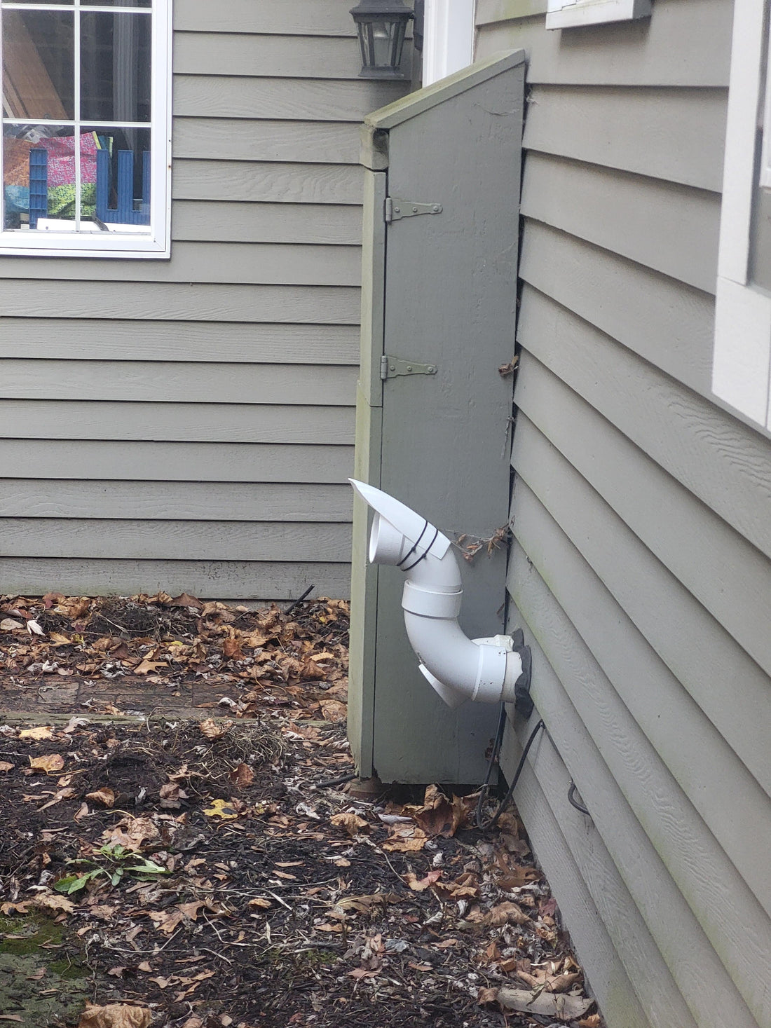 “LGQF-LL 2-inch PVC vent cap with stainless steel filter installed on furnace and tankless water heater vent pipe”
